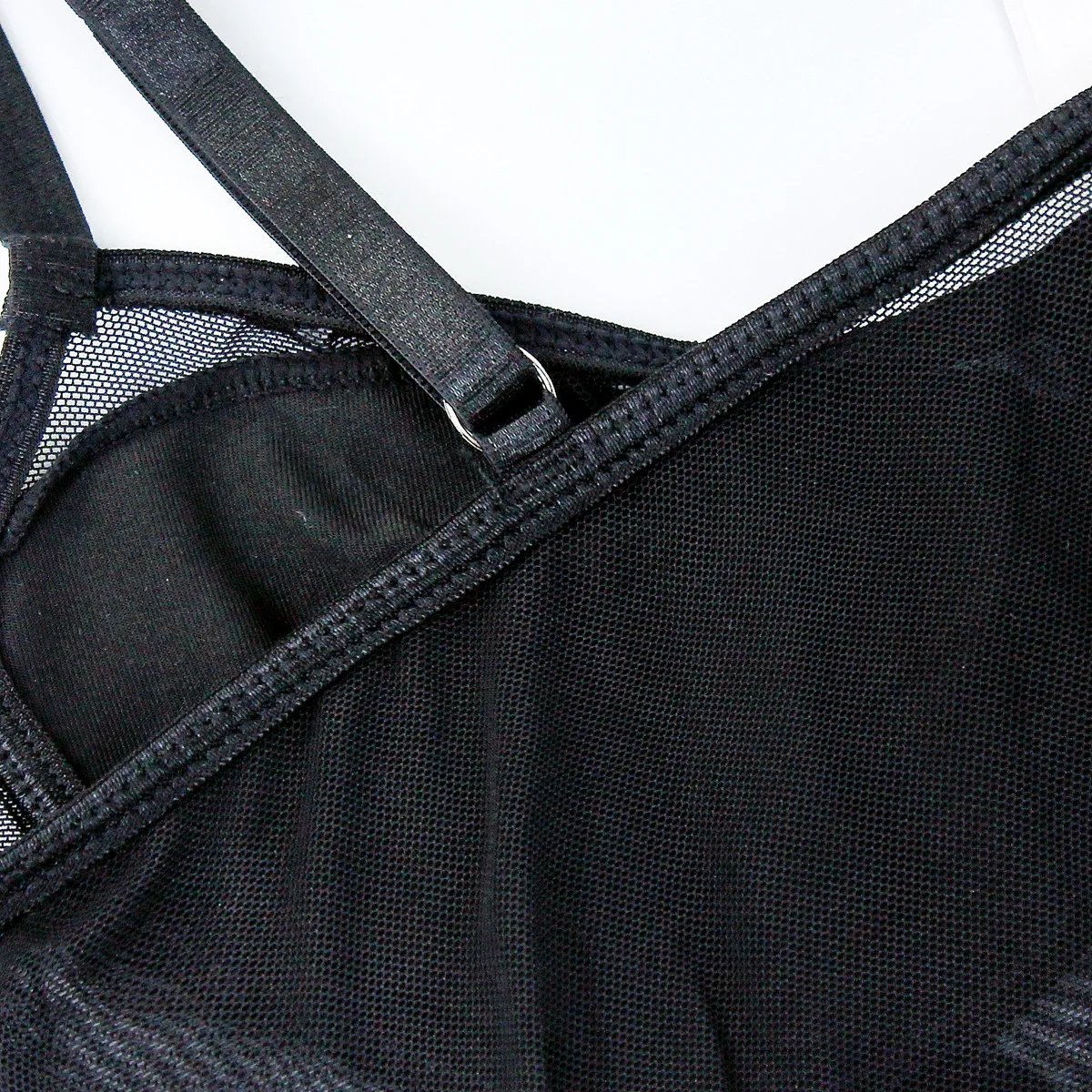 V-neck shaping, adjustable shoulder straps, reinforced soft padded bra, top